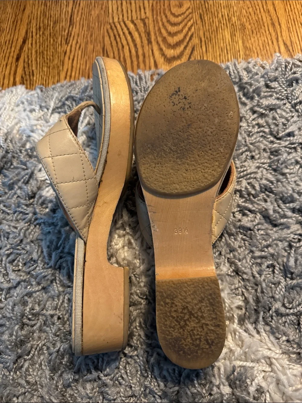 CHANEL Cream Quilted Leather Slide Mules with Logo Accent